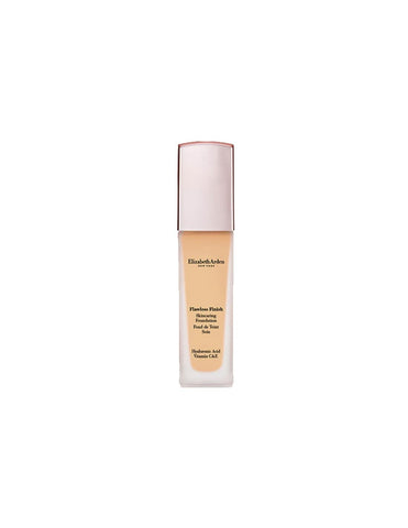 Elizabeth Arden Flawless Finish Skincaring Foundation by Jag Couture London - New York, close-up of the foundation bottle and applicator.