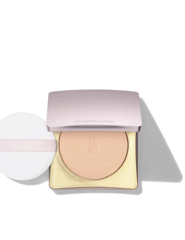 Elizabeth Arden Maq Powder Flawless Finish Skincare by Jag Couture London, close-up of the compact with smooth powder surface.