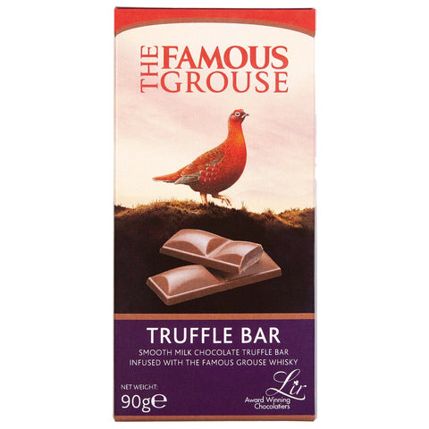 Jag Couture London-New York Famous Grouse milk chocolate and truffle bar, showing creamy chocolate with truffle pieces.