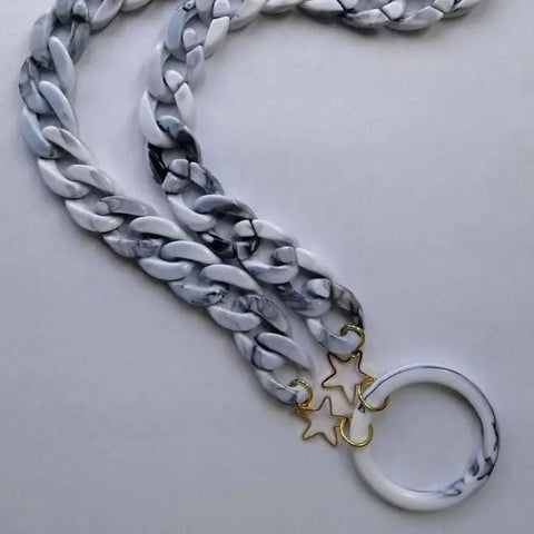 Gray marble sunglasses necklace by Jag Couture London New York, featuring a stylish and modern accessory with marble accents.