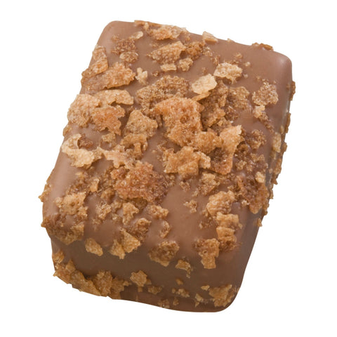 Jag Couture London milk praline with crushed feuilletine, 18.3g, showcasing the creamy chocolate treat with textured feuilletine topping.