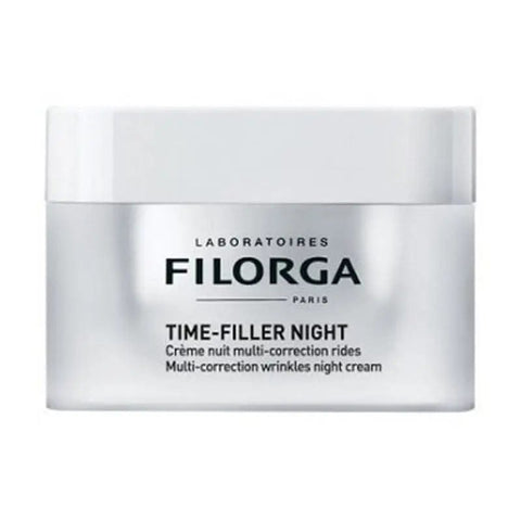 Filorga Time-Filler Night 5XP night cream in a 50ml jar, displayed with applicator and luxurious packaging.