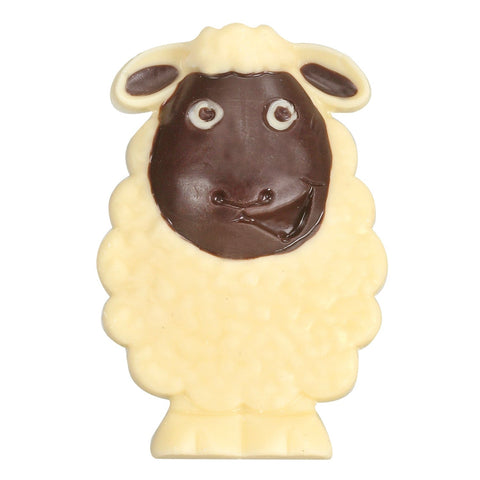 Decorated solid white chocolate sheep shaped candies from Jag Couture London, about 35 pieces, featuring detailed sheep designs.