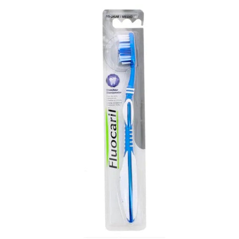 Jag Couture London - New York Fluocaril Toothbrush Whitening 40 Medium with soft bristles for effective teeth cleaning and whitening.