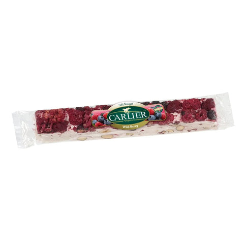 Forest fruits wrapped nougat bar from Jag Couture London in a display box, showcasing colorful fruit pieces and creamy texture.