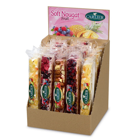 Assorted soft nougat bars in a display, featuring tropical fruit, wild berry, and strawberry flavors by Jag Couture London New York.