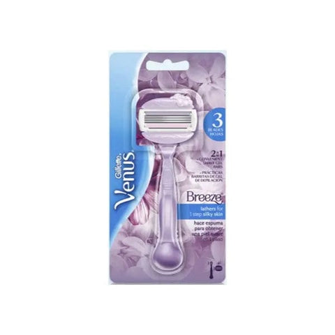 Gillette Venus Breeze Razor with handle and blades, branded by Jag Couture London New York, on a plain background.