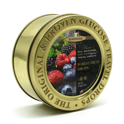Gold embossed tin of forest fruit flavor travel sweets by Jag Couture London - New York, showing the decorative packaging.