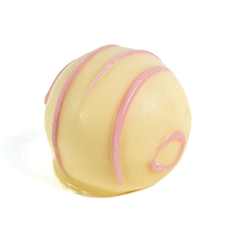 Jag Couture London Grandma's Apple Pie white chocolate truffle filled with apple pie ganache, 12.5g, showcasing a glossy chocolate exterior.