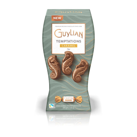Guylian Temptations caramel-filled seahorses, twist-wrapped chocolates by Jag Couture London New York, displayed on a white surface.