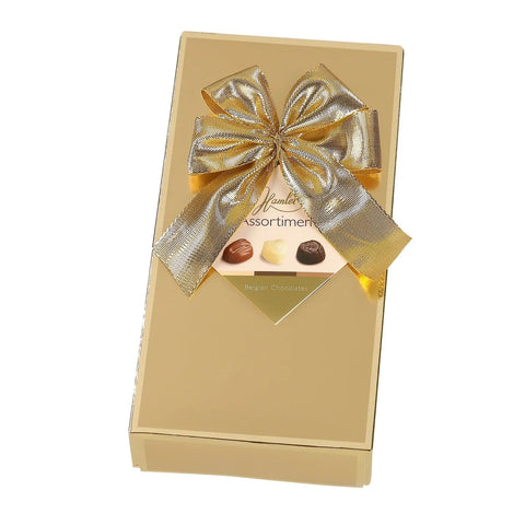 Hamlet gold gift box of assorted chocolates by Jag Couture London - New York, featuring an elegant gold packaging with a variety of chocolates.