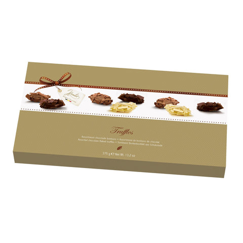 Hamlet milk, white, and dark chocolate flaked truffles in a gift carton by Jag Couture London New York.