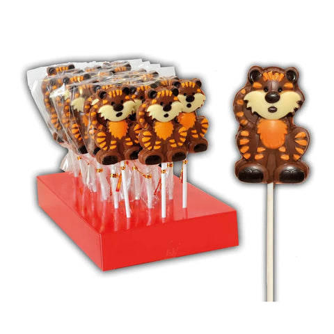 Hand-decorated chocolate tiger lollipops displayed in a tray, crafted by Jag Couture London - New York.