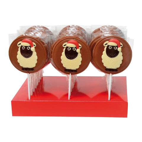 Hand-decorated milk chocolate Christmas sheep lollies by Jag Couture London - New York, featuring festive holiday designs.