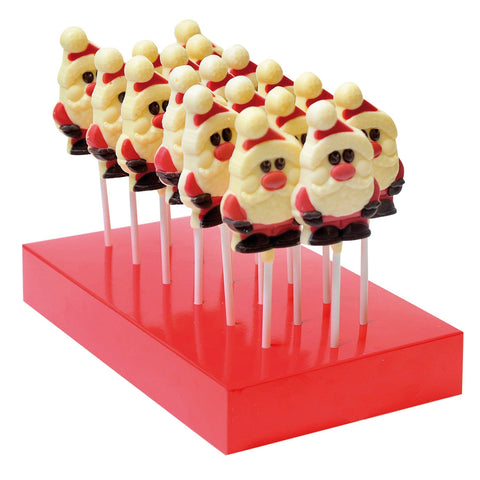 Hand-decorated solid white chocolate Santa lollies by Jag Couture London - New York, featuring festive holiday designs.