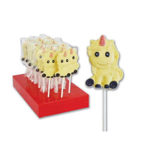 Hand-decorated white chocolate Una the unicorn lollipops displayed, crafted by Jag Couture London New York.