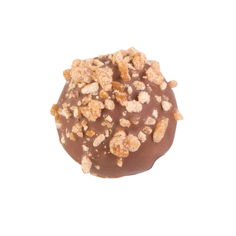 Jag Couture London New York hazelnut truffle with milk chocolate, fresh cream, and hazelnut filling, 13g piece.