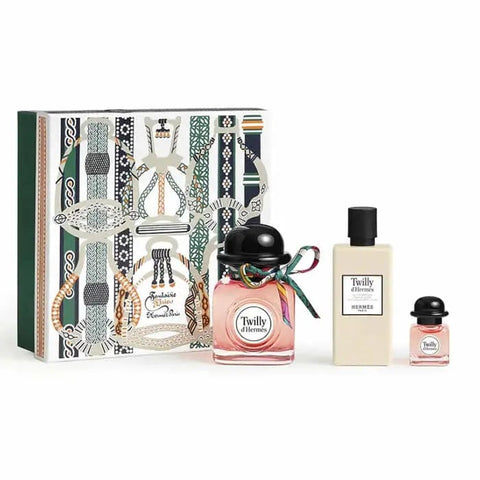 Set of three Hermes Twilly Eau de Parfum spray bottles, 85ml each, featuring elegant packaging and floral fragrance.