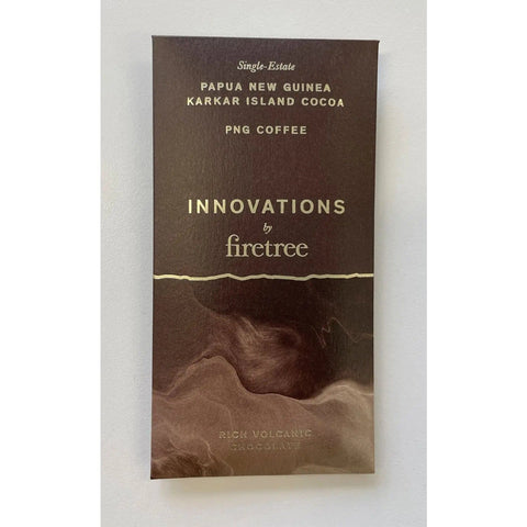 Dark chocolate bar by Jag Couture London featuring Karkar Island cocoa and PNG coffee flavors, with rich, textured surface.