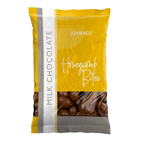 Joybags milk chocolate covered honeycomb bites by Jag Couture London - New York, showing golden honeycomb pieces coated in smooth milk chocolate