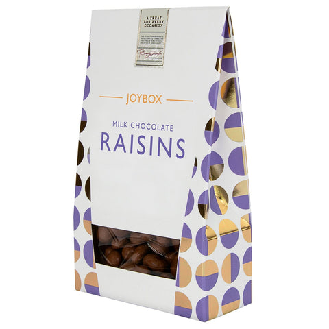 Jag Couture London-New York Joybox raisins coated in smooth milk chocolate inside a carton, ready to enjoy a sweet treat.