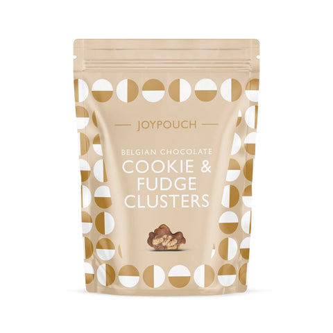 Joypouch milk chocolate covered cookie and fudge clusters by Jag Couture London New York, showcasing glossy chocolate coating and crunchy texture.