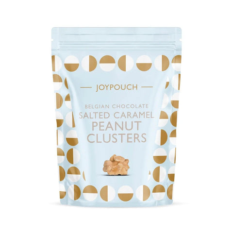 Joypouch milk chocolate-covered salted caramel clusters by Jag Couture London - New York, close-up of sweet caramel and rich chocolate pieces.