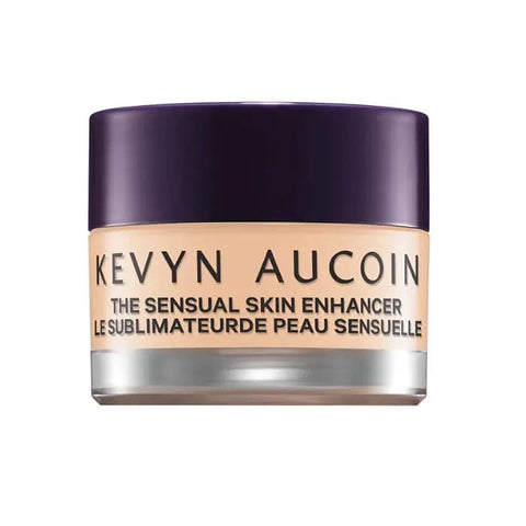 Kevyn Aucoin Sensual Skin Enhancer Concealer Sx 5 by Jag Couture London New York, close-up of the concealer tube with product label.