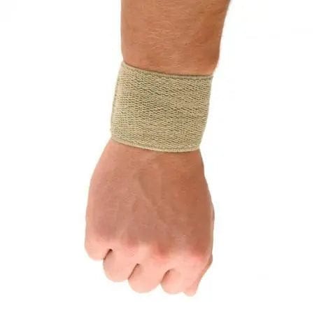 Small beige Lástic-Bass Muñequera by Jag Couture London - New York, designed for comfortable wrist support.