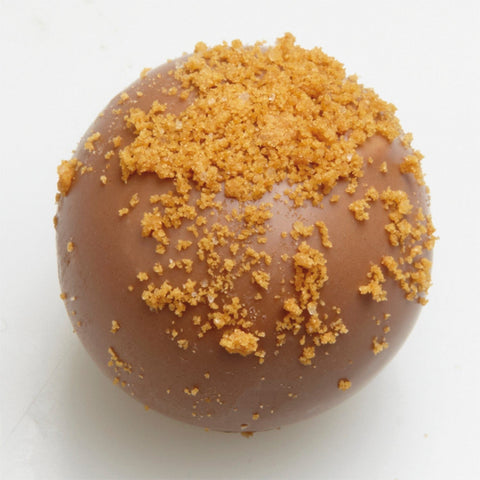 Lenart milk chocolate with spiced biscuit praline from Jag Couture London New York, 15.2g bar with detailed chocolate and biscuit filling.