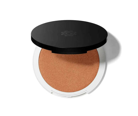 Lily Lolo mineral highlighter and bronzer compact by Jag Couture London New York, featuring a shimmering face makeup product.