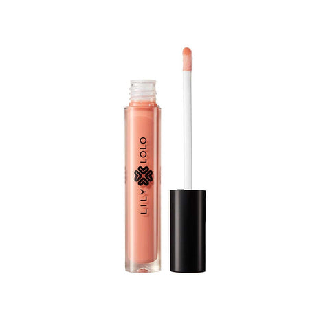 Jag Couture London - New York Lily Lolo clear lip gloss applied on lips, featuring a glossy, transparent finish for a natural look.