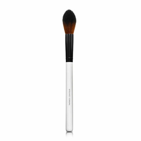 Lily Lolo blush brush by Jag Couture London - New York for application of powder blush, close-up of the makeup brush in hand