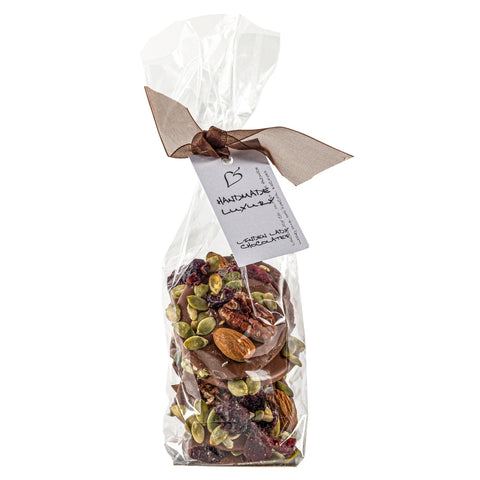 Linden Lady gift bags of milk chocolate mendiants by Jag Couture London New York, featuring elegantly wrapped chocolates.