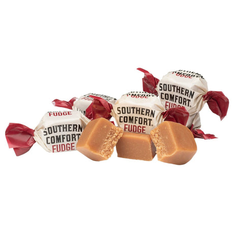 Jag Couture London New York Luxardo Amaretto flavored fudge in an oval tin, showcasing creamy, almond-flavored confectionery.