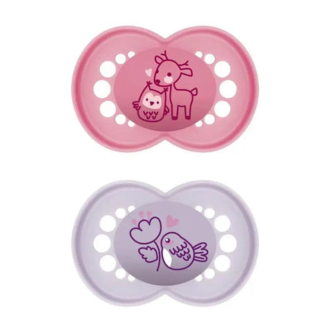 Two Mam Original Pure Silicone Pacifiers for 6 months, pink and purple, designed for babies over 6 months, by Jag Couture London New York.