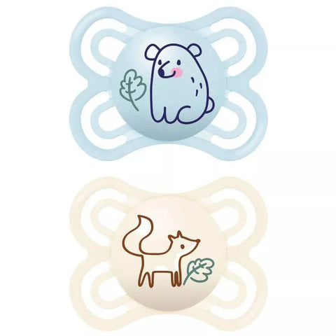 Two blue Mam Perfect Pacifiers for 2-6 months, designed for infants, by Jag Couture London New York.