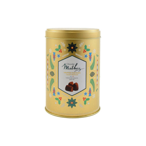 Mathez French cocoa dusted truffles in a gold Christmas tin by Jag Couture London New York, festive holiday confection display.