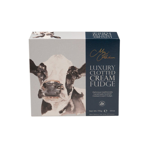 Carton of Meg Hawkins Friesian Cow clotted cream fudge by Jag Couture London New York, featuring a detailed Friesian cow illustration.