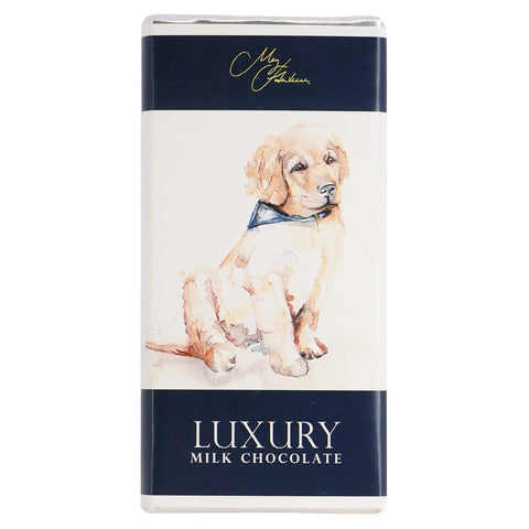 Milk chocolate bar from Jag Couture London featuring a Meg Hawkins Golden Retriever design, wrapped in decorative packaging.