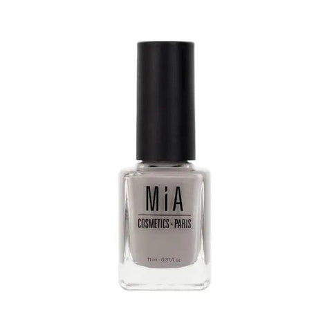 Jag Couture London - New York Mía Cosmetics Moonstone nail polish bottle with deep blue and shimmering finish.