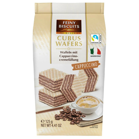 Jag Couture London Mignon Cubus wafers with cappuccino cream filling in sachet bag, close-up of the packaged snack.