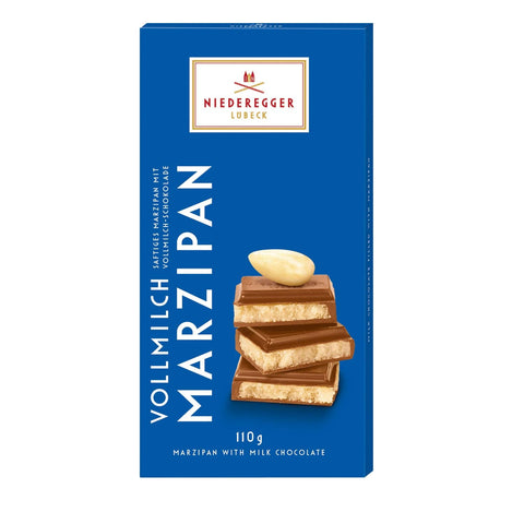 Milk chocolate covered marzipan bar by Jag Couture London New York, showcasing smooth chocolate coating and marzipan center.