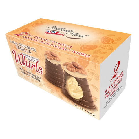 Twin pack of Jag Couture London walnut whirls filled with milk chocolate and vanilla ganache, showcasing flaky pastry and walnut pieces.
