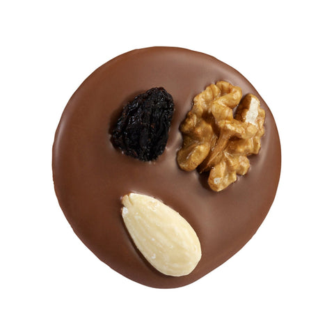 Milk Mendiant by Jag Couture London: milk chocolate disc with nuts and raisins, 14g, shown in a close-up image.
