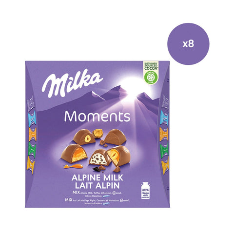 Assorted Milka Moments alpine milk chocolates in a gift box, featuring smooth, creamy chocolates from Jag Couture London - New York.