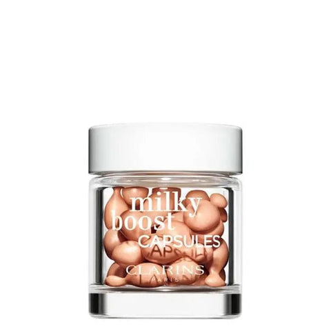 Jag Couture London Milky Boost Fond de Teint 5 foundation capsules in a sleek container, designed for a natural makeup finish.