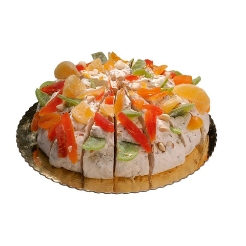 Handmade soft nougat cake with mixed fruit flavors from Jag Couture London New York, showcasing colorful fruit pieces and a smooth texture.