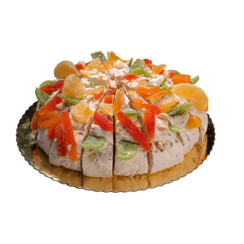 Mixed fruit flavored handmade soft nougat cake by Jag Couture London New York, showcasing colorful fruit pieces and a soft cake texture.