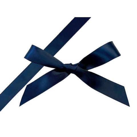 Navy blue single-faced satin ribbon by Jag Couture London New York, smooth and shiny fabric for gift wrapping or craft projects.